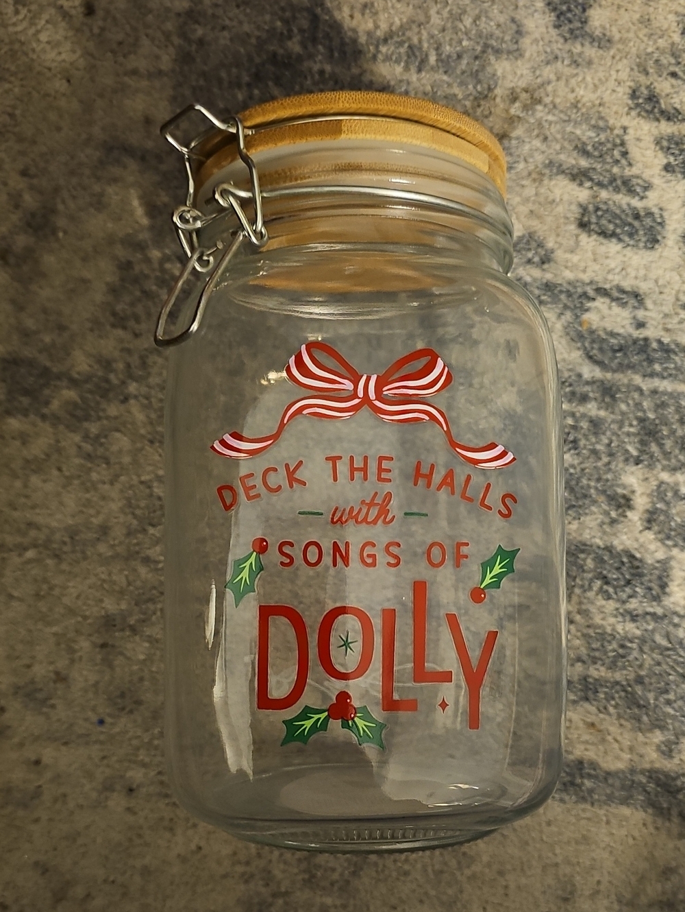 Dolly Parton- Clear Holiday Storage Jar with Wooden Lid and Red Holiday Graphics